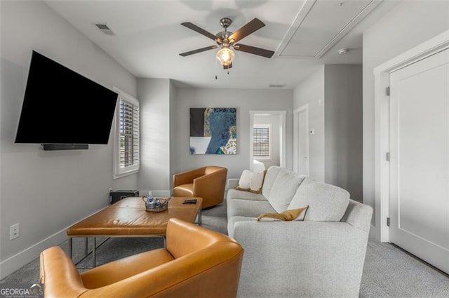 111 Brighton Blvd, Woodstock, GA 30188 - living area with visible vents, baseboards, a ceiling fan, attic access, and light colored carpet
