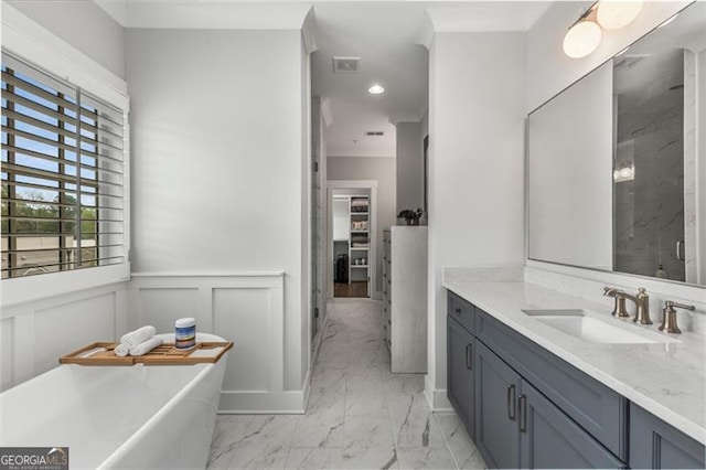 111 Brighton Blvd, Woodstock, GA 30188 - bathroom with a stall shower, wainscoting, visible vents, a freestanding bath, and marble finish floor