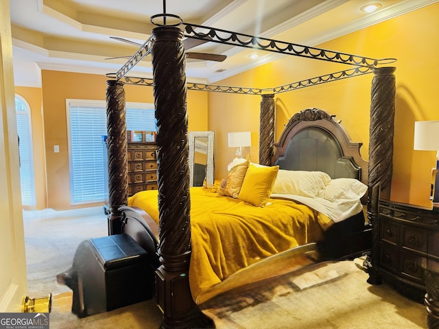 bedroom featuring crown molding, carpet floors, and multiple windows