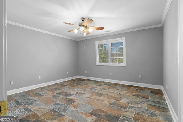 unfurnished room featuring stone finish floor, ornamental molding, a ceiling fan, visible vents, and baseboards