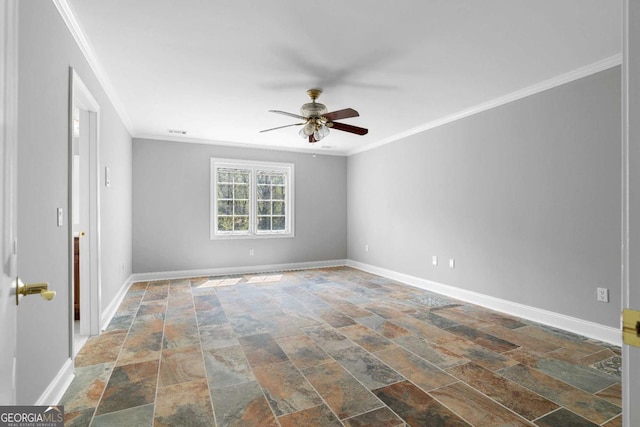 unfurnished room featuring ornamental molding, baseboards, a ceiling fan, and stone finish floor
