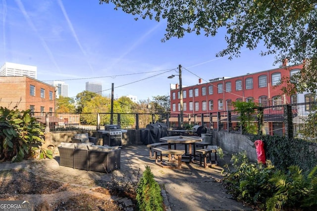 view of patio / terrace featuring fence and area for grilling