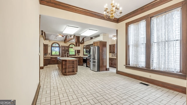 316 E 3rd Ave, Rome, GA 30161 - kitchen featuring stainless steel appliances, baseboards, light countertops, ornamental molding, and a chandelier