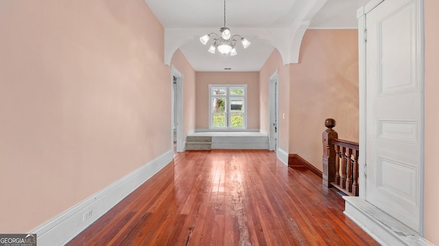 316 E 3rd Ave, Rome, GA 30161 - entrance foyer with arched walkways, hardwood / wood-style floors, and baseboards