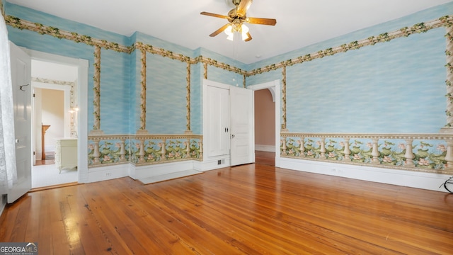 316 E 3rd Ave, Rome, GA 30161 - unfurnished room featuring wallpapered walls, ceiling fan, and hardwood / wood-style flooring
