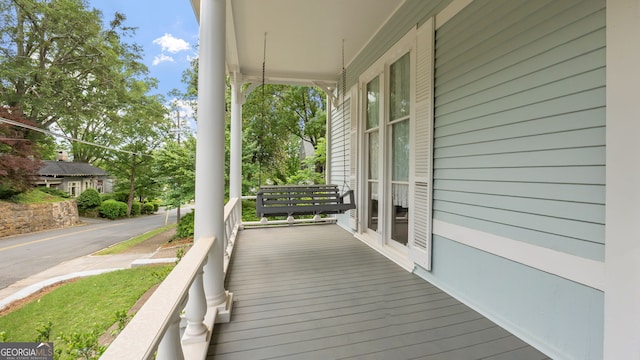 316 E 3rd Ave, Rome, GA 30161 - wooden deck with a porch