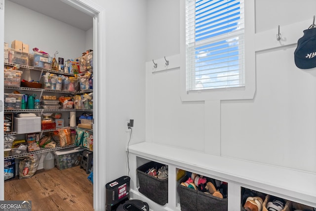 mudroom with wood finished floors