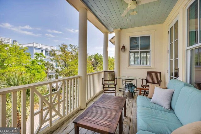 17 Sea Oats Ln, Saint Simons, GA 31522 - balcony with an outdoor living space and a ceiling fan