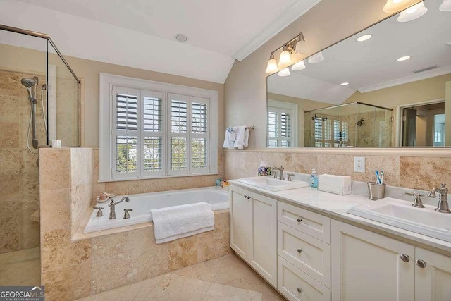 17 Sea Oats Ln, Saint Simons, GA 31522 - bathroom featuring a sink, visible vents, a shower stall, and a garden tub
