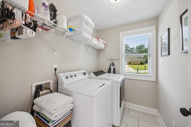 41 Laurel Rdg, Forsyth, GA 31029 - washroom with independent washer and dryer, baseboards, and light tile patterned flooring