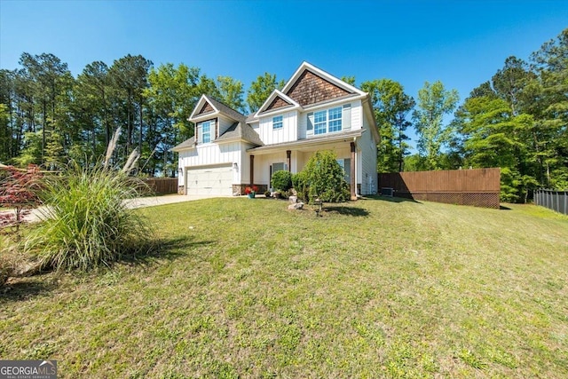 5321 Felles Way, Forsyth, GA 31029 - craftsman-style house with board and batten siding, driveway, and an attached garage