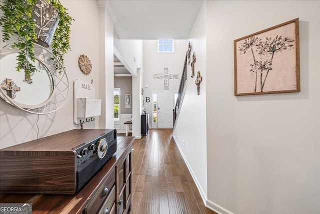 5321 Felles Way, Forsyth, GA 31029 - hall featuring dark wood-style floors and a towering ceiling
