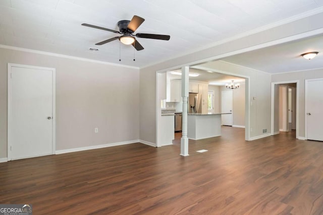 2125 Perkerson Mill Rd, Austell, GA 30106 - unfurnished living room featuring baseboards, ceiling fan with notable chandelier, ornamental molding, and dark wood finished floors