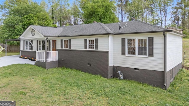 2125 Perkerson Mill Rd, Austell, GA 30106 - view of front of property featuring concrete driveway, a front lawn, crawl space, and roof with shingles