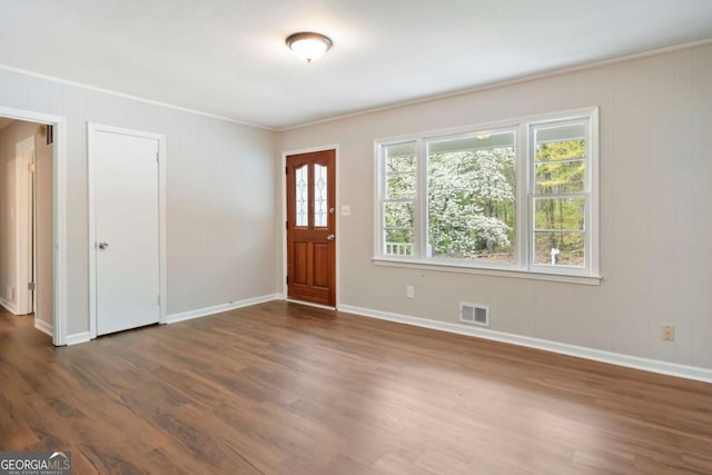 2125 Perkerson Mill Rd, Austell, GA 30106 - entryway with visible vents, baseboards, crown molding, and wood finished floors