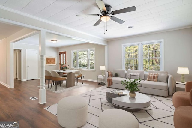 2125 Perkerson Mill Rd, Austell, GA 30106 - living room with visible vents, crown molding, a ceiling fan, and wood finished floors