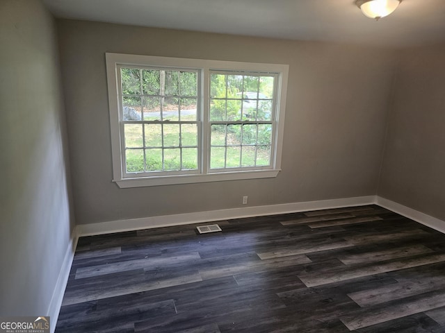 1956 Shirley St SW, Atlanta, GA 30311 - unfurnished room featuring baseboards and dark wood-style floors