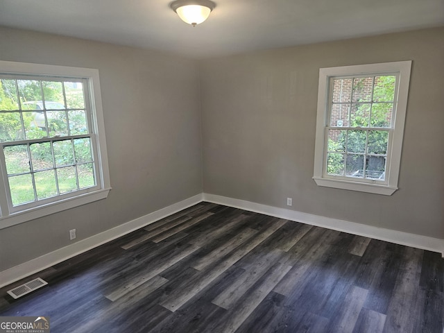 1956 Shirley St SW, Atlanta, GA 30311 - spare room featuring plenty of natural light, baseboards, and dark wood-style floors