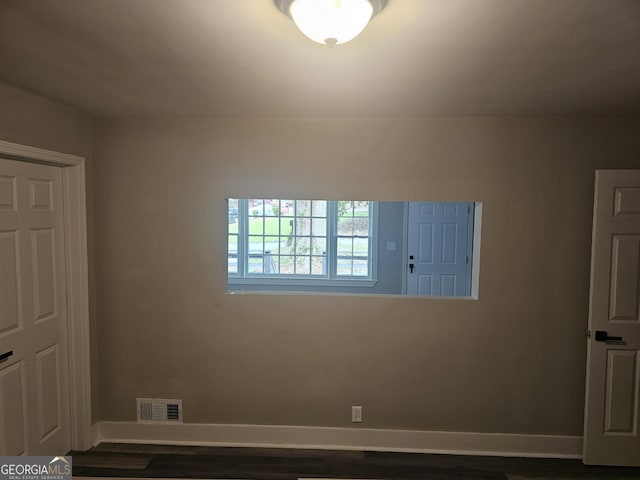1956 Shirley St SW, Atlanta, GA 30311 - unfurnished room featuring baseboards and dark wood-style floors