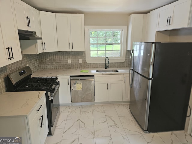 1956 Shirley St SW, Atlanta, GA 30311 - kitchen featuring stainless steel appliances, a sink, light marble finish flooring, and under cabinet range hood