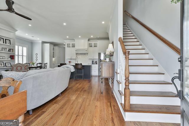 LOT5 Casey Rd, Newnan, GA 30263 - living area with ceiling fan, crown molding, stairs, wood finished floors, and recessed lighting