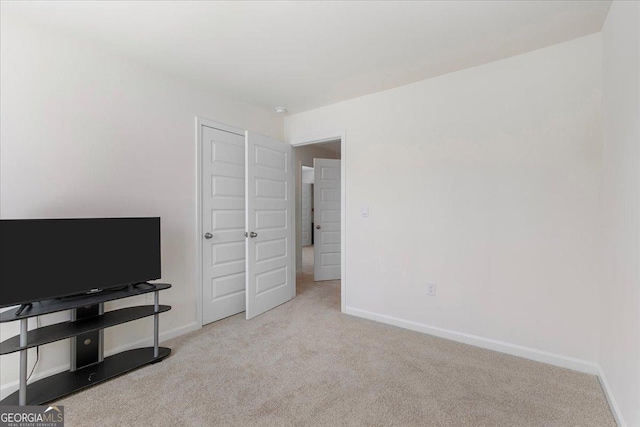 interior space featuring baseboards