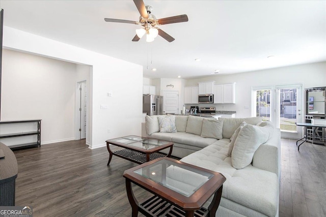 living area with ceiling fan, dark wood-style flooring, baseboards, and recessed lighting