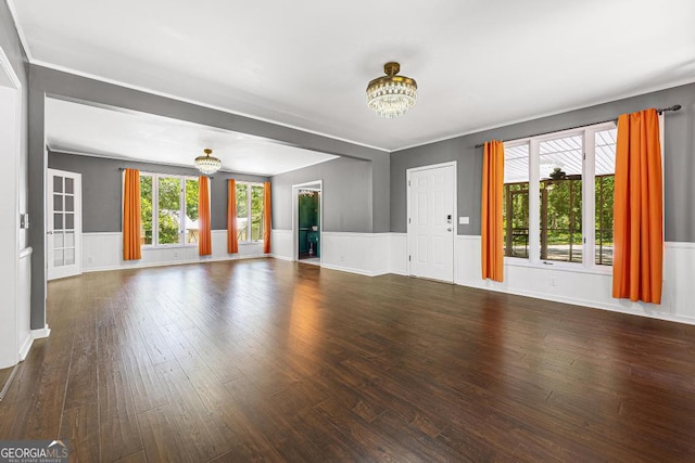 209 Westminster Hwy, Westminster, SC 29693 - unfurnished living room featuring a chandelier, wainscoting, wood-type flooring, and ornamental molding