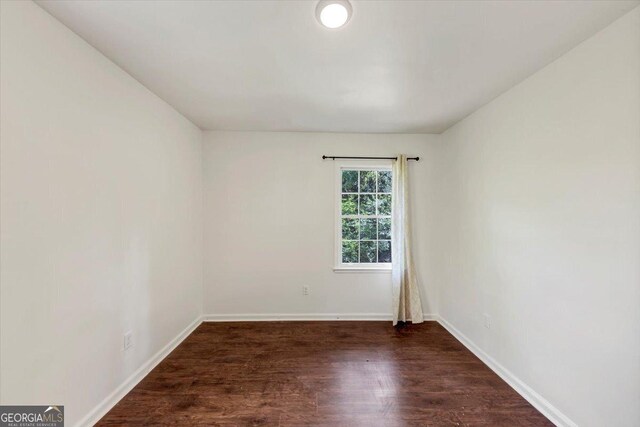 856 Glenway Dr, East Point, GA 30344 - unfurnished room with dark wood-style flooring and baseboards