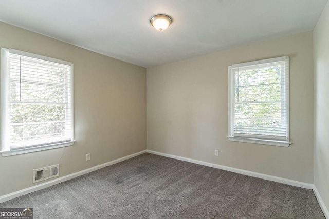 2062 Whites Mill Rd, Decatur, GA 30032 - spare room featuring baseboards, carpet, and visible vents
