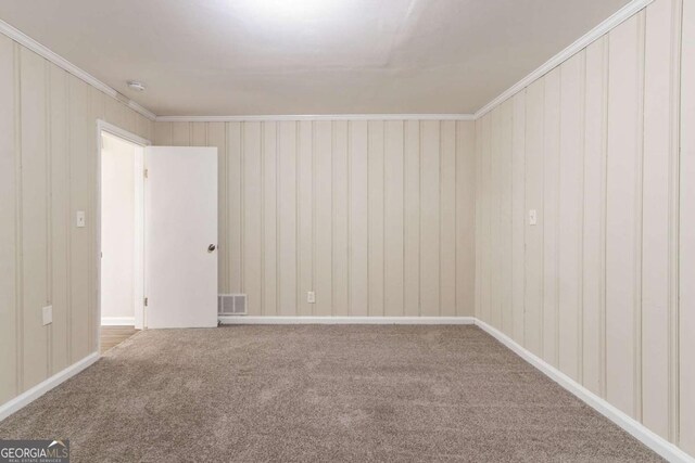 2062 Whites Mill Rd, Decatur, GA 30032 - carpeted spare room with ornamental molding and visible vents