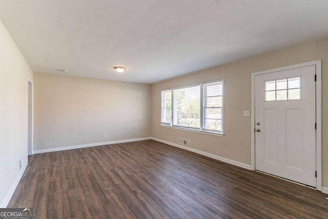 2062 Whites Mill Rd, Decatur, GA 30032 - foyer entrance featuring visible vents, baseboards, and dark wood finished floors