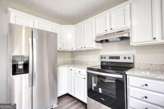 kitchen with white cabinets, appliances with stainless steel finishes, a textured ceiling, under cabinet range hood, and dark wood-type flooring