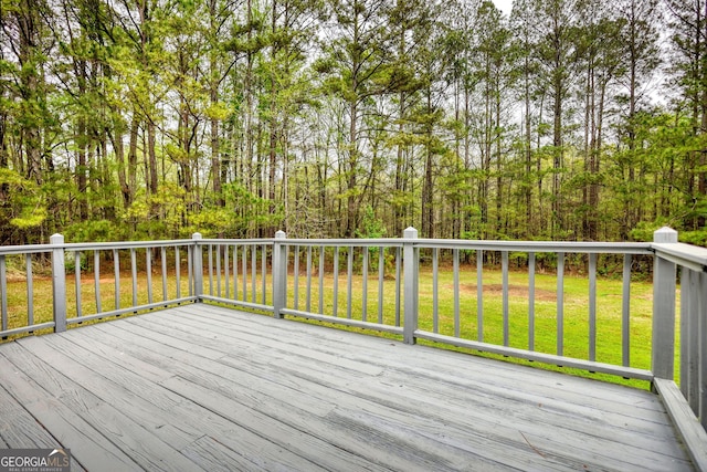 deck featuring a yard