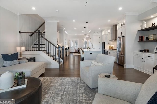 825 Maplewood Dr, Roswell, GA 30075 - living room featuring recessed lighting, stairs, dark wood-style floors, and ornamental molding
