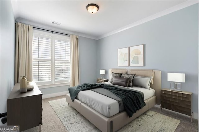 825 Maplewood Dr, Roswell, GA 30075 - carpeted bedroom featuring baseboards, ornamental molding, and visible vents