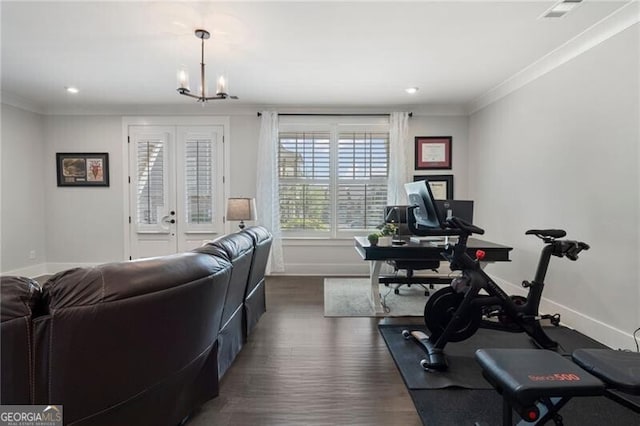 825 Maplewood Dr, Roswell, GA 30075 - workout area with crown molding, visible vents, baseboards, and dark wood finished floors