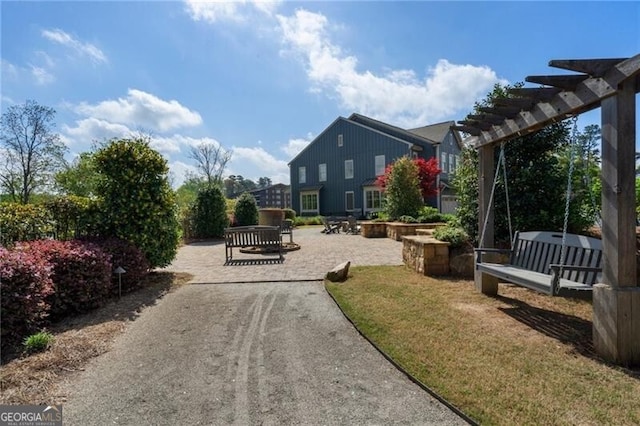 825 Maplewood Dr, Roswell, GA 30075 - exterior space featuring a patio and a pergola