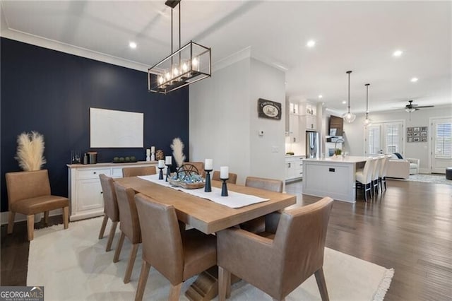 825 Maplewood Dr, Roswell, GA 30075 - dining area featuring baseboards, light wood-style floors, crown molding, recessed lighting, and ceiling fan with notable chandelier
