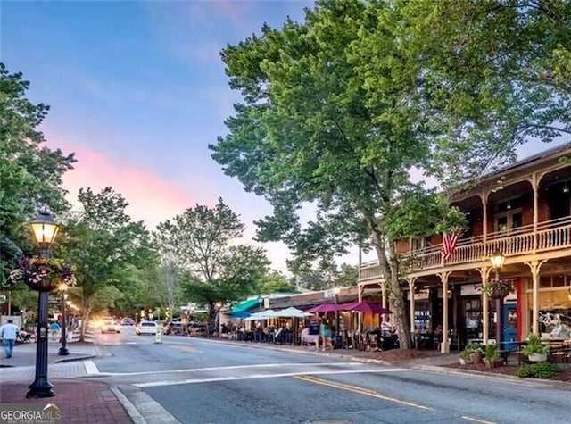825 Maplewood Dr, Roswell, GA 30075 - view of street featuring street lights, sidewalks, and curbs
