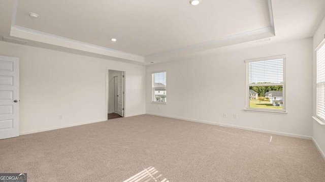 1139 Blue Juniper Cir, Loganville, GA 30052 - empty room with a raised ceiling, recessed lighting, baseboards, and carpet floors