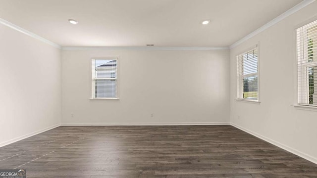 1139 Blue Juniper Cir, Loganville, GA 30052 - unfurnished room with dark wood-style flooring, baseboards, and crown molding