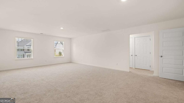 1139 Blue Juniper Cir, Loganville, GA 30052 - empty room featuring recessed lighting, baseboards, and carpet floors