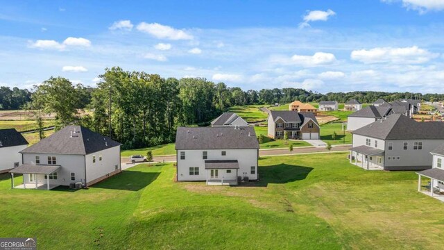 1139 Blue Juniper Cir, Loganville, GA 30052 - drone / aerial view with a residential view