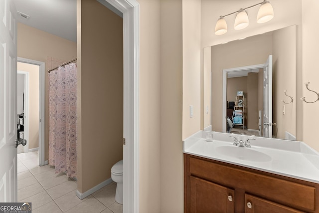6058 Grand Reunion Dr, Hoschton, GA 30548 - ensuite bathroom featuring visible vents, ensuite bathroom, toilet, vanity, and tile patterned flooring