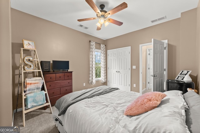 6058 Grand Reunion Dr, Hoschton, GA 30548 - bedroom featuring a closet, carpet flooring, ceiling fan, and visible vents