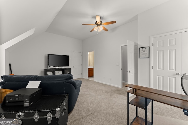 6058 Grand Reunion Dr, Hoschton, GA 30548 - living area featuring baseboards, light colored carpet, ceiling fan, and lofted ceiling