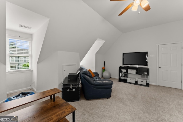 6058 Grand Reunion Dr, Hoschton, GA 30548 - living room with visible vents, baseboards, a ceiling fan, carpet, and vaulted ceiling