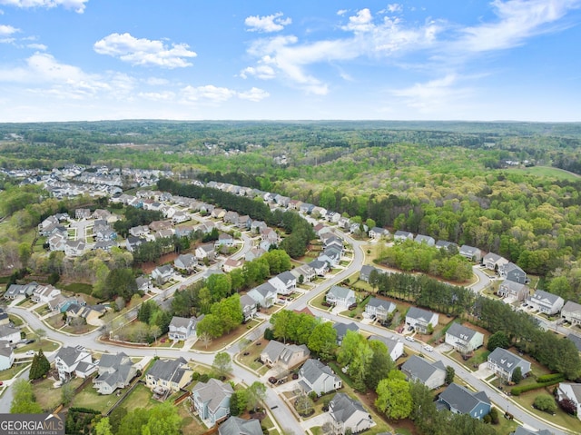 6058 Grand Reunion Dr, Hoschton, GA 30548 - birds eye view of property featuring a view of trees and a residential view