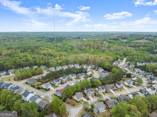 6058 Grand Reunion Dr, Hoschton, GA 30548 - bird's eye view featuring a wooded view and a residential view